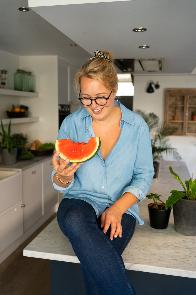 nutritional therapist eating a Watermelon
